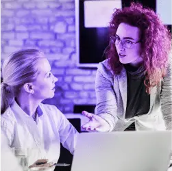 two ladies having a discussion